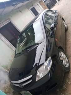 A picture of honda city available ac needs gas and body needs work