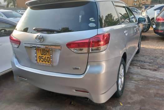 A picture of WISH 2011 7 Seater Black interior 0750147312. Nakasero Road near