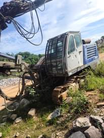 A picture of Excavator Wheel loader and hydraulic crawler drill.