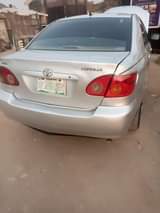 A picture of Toyota corolla 05 engine is taping but not smoking just