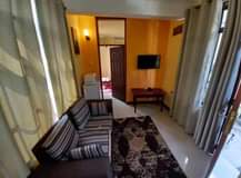 A picture of 1bedroom living room and kitchen at mikocheni