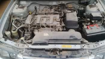 A picture of Fabric seat Manual gear Tapping glass Car situated in the