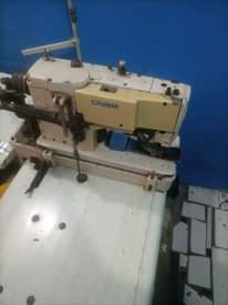 A picture of botton Holes machine