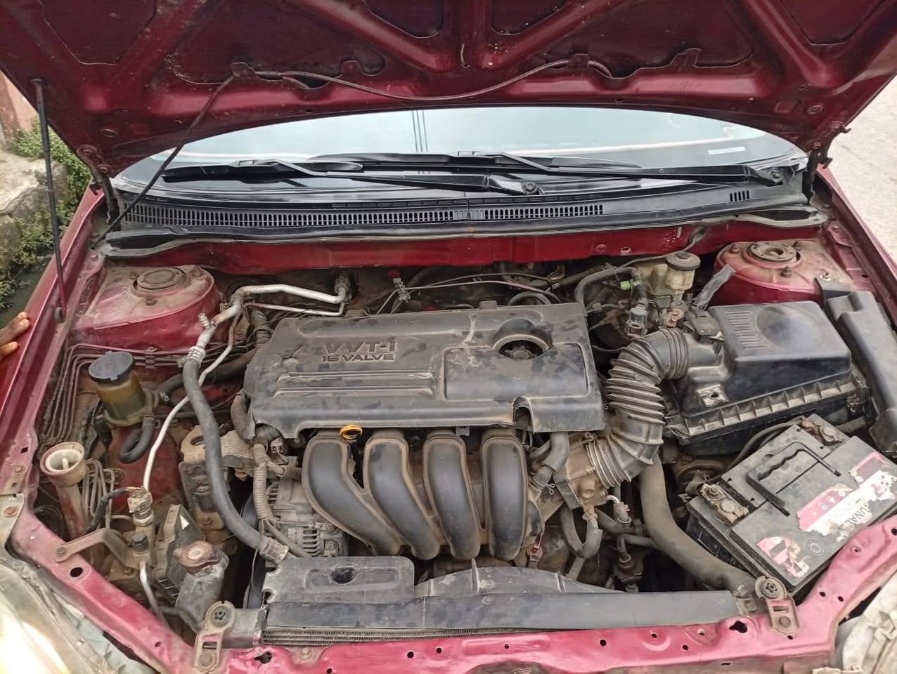 A picture of Toyota Corolla 05 painted on first body untouched engine and