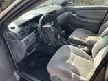 A picture of Toyota Corolla 2004 Ac Gear Engine is tapping a little