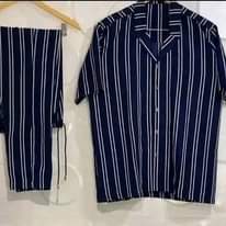 A picture of My husband handwork cut and sew Fashion designer 08035070839 Location