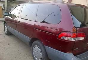 A picture of Urgent sales Super Clean neatly used Toyota Sienna 02 fabric