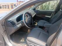 A picture of Super clean Toyota Camry 2006 XLE REGISTERED first body nothing