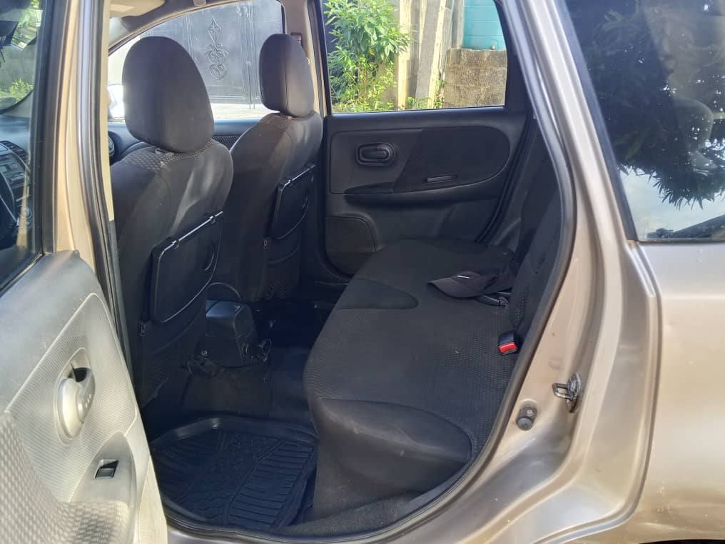 A picture of Nissan Note 2006 First body Toks standard Fuel Economy