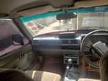 A picture of 1990 TOYOTA Hilux Dark blue