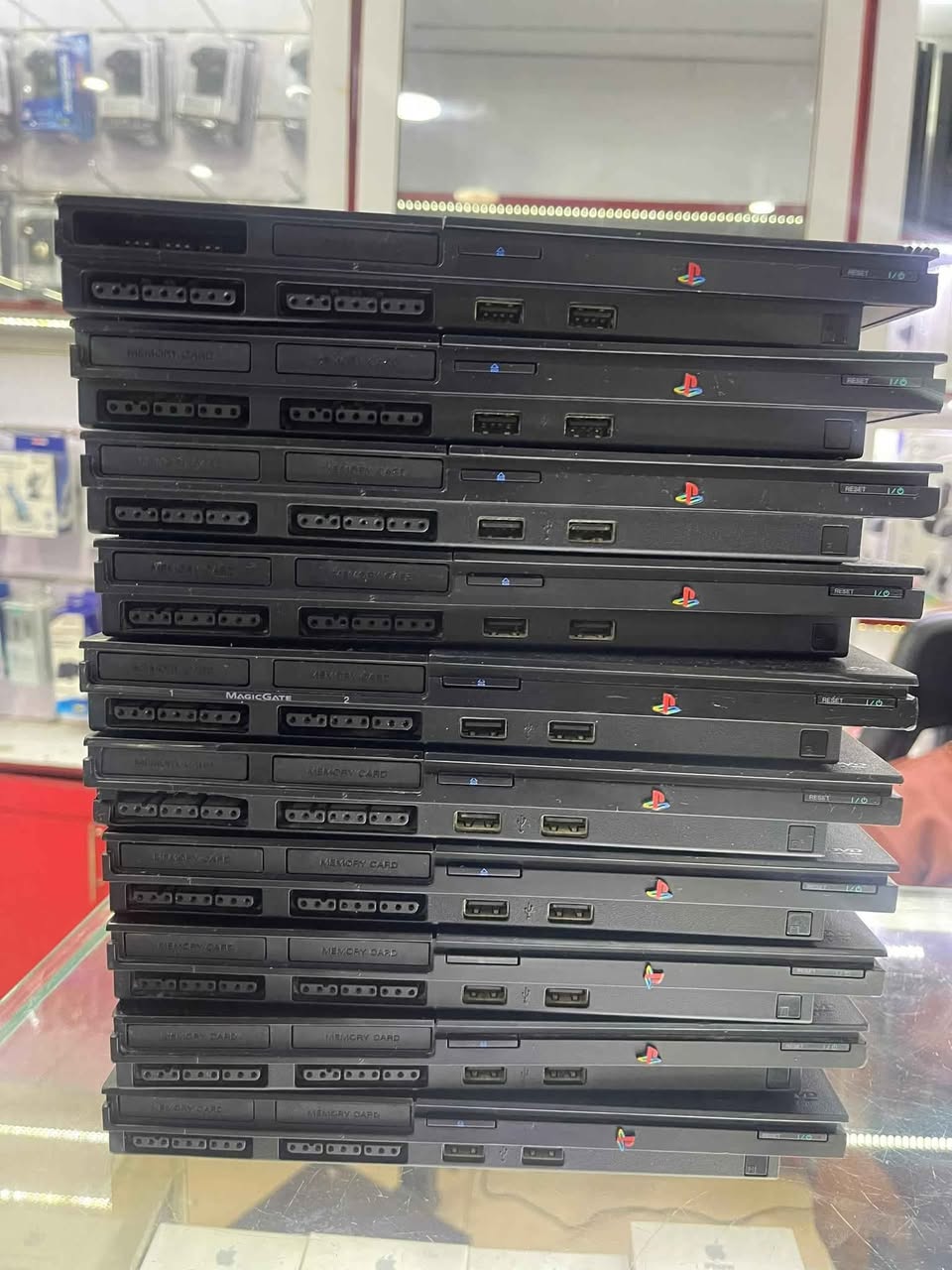 A picture of Playstation 2 with 20games