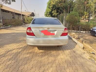 A picture of 03 Camry repainted on first body engine in pristine condition