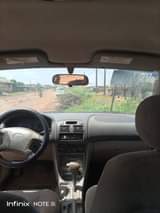 A picture of Clean Nigerian Used Toyota Corolla First body Clean Fabric interior