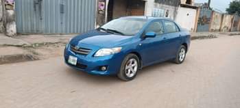 A picture of Very clean Toyota Corolla with good engine and gear chilling