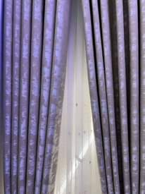 A picture of Curtains and rods