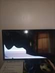A picture of Hisense flameless 32 with broken screen at 160 000