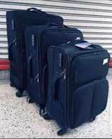 A picture of Mabegi Poa Original suitcases imara na Mpya Kabisa