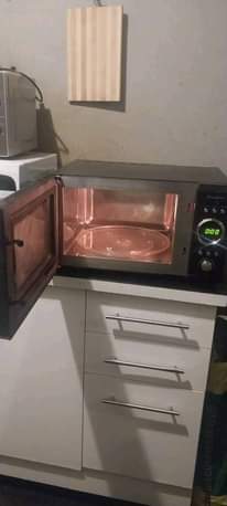 A picture of New microwave on quick sale