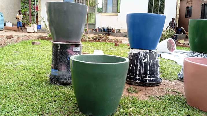 A picture of V shaped orchid xl ceramic finish cement pots