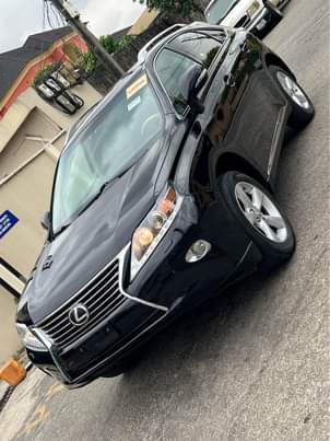 A picture of NEWLY ARRIVED FOREIGN USED 2010 RX350 CLEAN TITLE WIT REVERSE