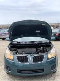 A picture of QUICK SALE FIRST BODY PONTIAC VIBE 2009 UNTEMPERED COROLLA ENGINE