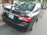 A picture of 2012 Toyota Corolla first body pan no Nigeria paint Price