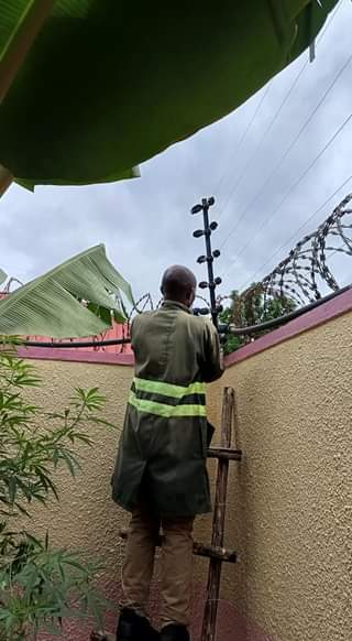 A picture of CCTV satellite and electric fence installations