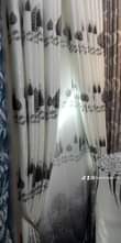 A picture of Black out ant transparent cartains at affordable price