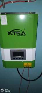 A picture of 2kva 24v Xtra power inverter and 2 luminous battery