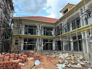 A picture of 10 unit apartment block for sale in Kyaliwajjala town Kira