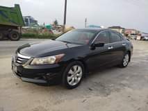A picture of NEATLY USED 2009 V6 WITH ALL CATALYST INTACT