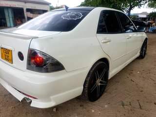 A picture of Toyota Alteza Engene 4silinder Yamaha Mwaka 2003 Cc1990 Full Ac