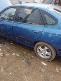 A picture of As e dey hot hundai 2004 model Engine untouchable Gear