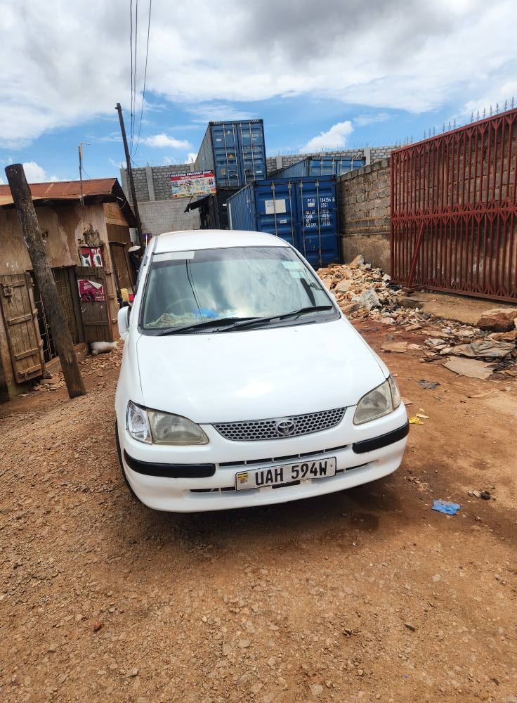 A picture of A White Toyota Corolla Spacio