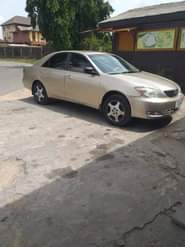 A picture of Toyota Camry Big daddy Color Gold Model 2003 Neatly Nigeria