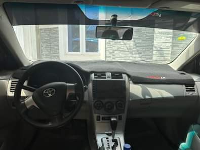 A picture of Extremely clean 2012 Toyota Corolla with ac gear and engine