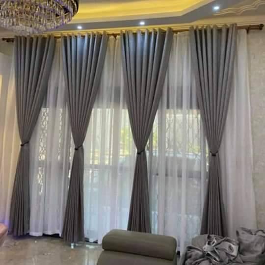A picture of CURTAINS CARPETS OFFICE BLINDs