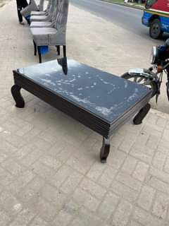 A picture of Nauza dinning table and coffee table 0684780098