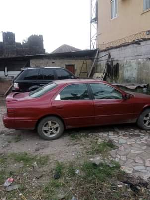 A picture of Clean red Camry tinybig