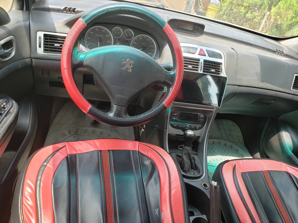 A picture of Peugeot manual transmission engine and gearbox untampered location Gwarinpa Abuja
