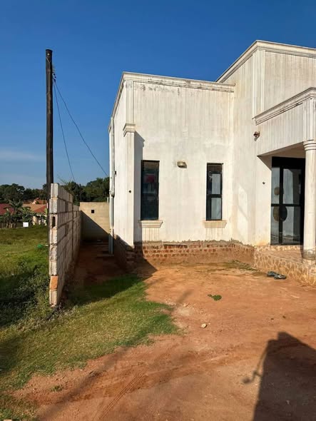 A picture of house on sale located Matugga city 3bedrooms sitting room land