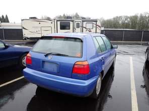 A picture of Category Four Door Hatchback Make Volkswagen Model Golf Color Blue