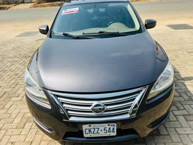 A picture of Neatly used 2013 14 Nissan Sentra car was bought brand
