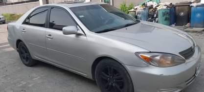A picture of Toks standard Toyota Camry with an ANDROID SCREEN Few years