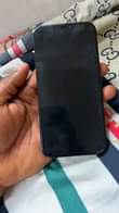 A picture of Iphone 12promax 128gb 87 battery health with carton 440k