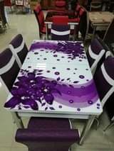 A picture of Modern Adjustable glass dining Tables with 6 seater at affordable