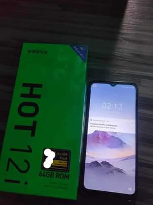 A picture of Infinix hot 12i bado mpya na box lake CHaji siku