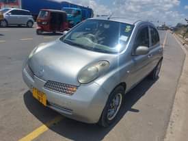 A picture of Nissan march new model nzuri mno full Ac matairi mpyaaa