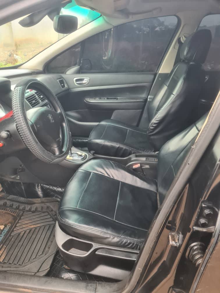 A picture of Naija used Peugeot 307 with sound and untempered engine 08138175643