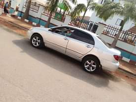 A picture of Another Sharp Distress Alert Clean 2005 Toyota Corolla with sound